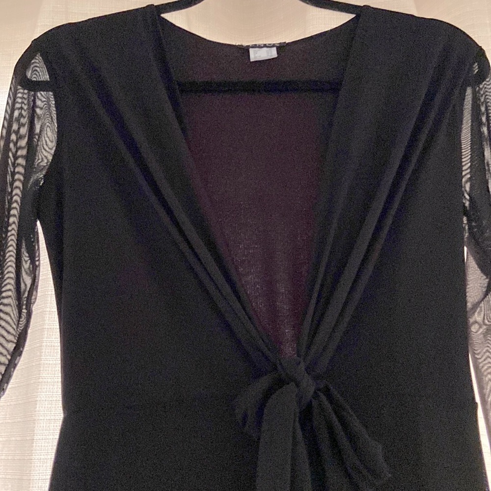 Brand new Black shorts underneath, Stretchy material to adjust to size